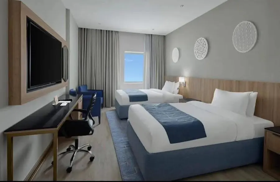 Room with three beds